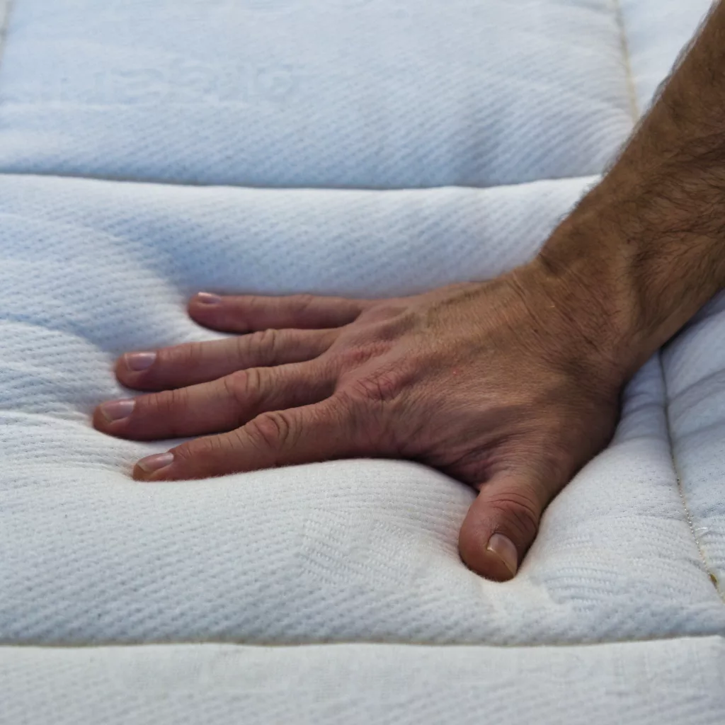 luxury organic bed solapedic emerald choice product shot hand showing firm square large